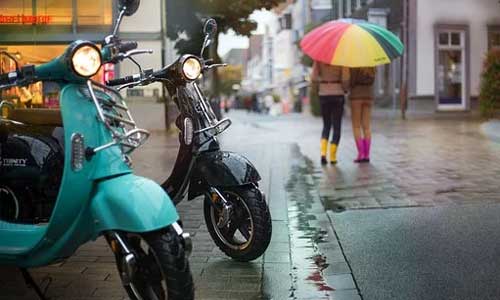 History-of-the-Italian-Scooter-parking-near-street